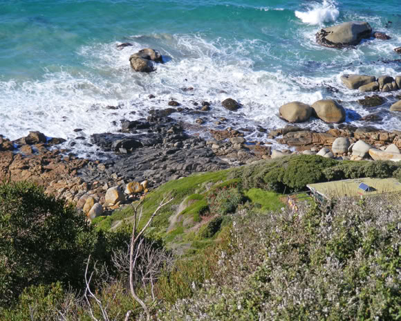 The False Bay Dolerite Dyke Swarm This black igneous rock, which is 130-million-years old, has intruded the older rocks when the Supercontinent Gondwana broke up. These dykes, with magnetic material, have helped map continental drift. Examples are found at Smitswinkel Bay and Dias Beach.  